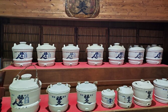 Private Full-Day Okunoshima and Hiroshima Sake Breweries Tour - Unveiling the Sake Brewing Process