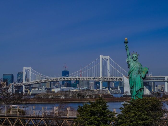 Rainbow Bridge And Statue Of Liberty