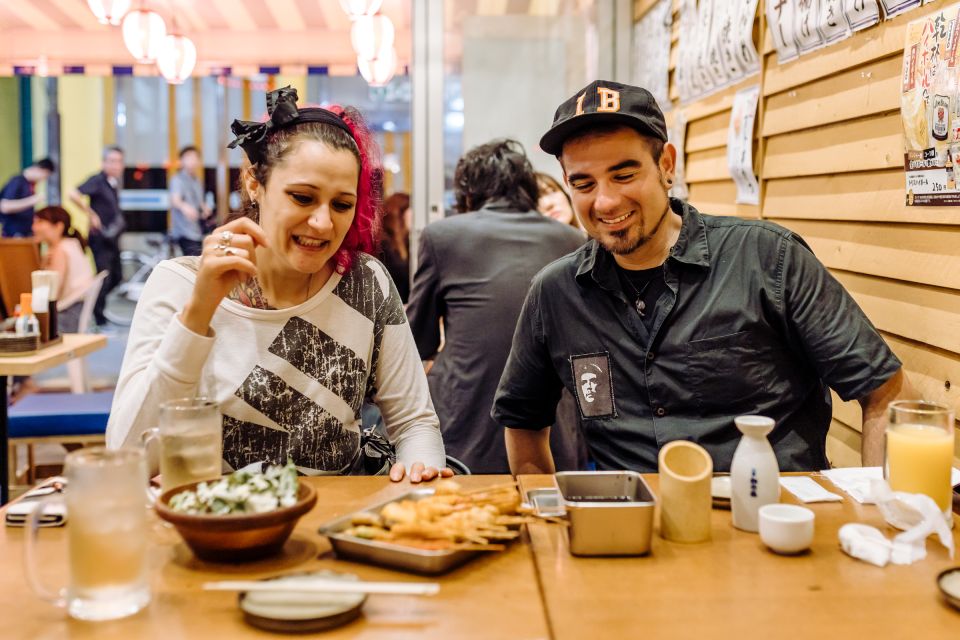 Osaka: Eat Like a Local Street Food Tour - Exploring Dotonbori: Heart of Osakas Food Scene