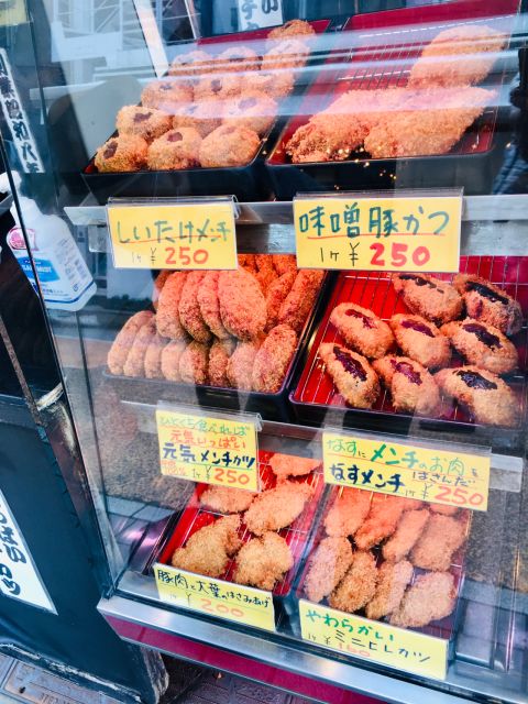 Yanaka & Nezu: Walking Tour in Tokyo's Nostalgic Old Towns - Immerse Yourself in the Beauty of Vermilion Torii Gates